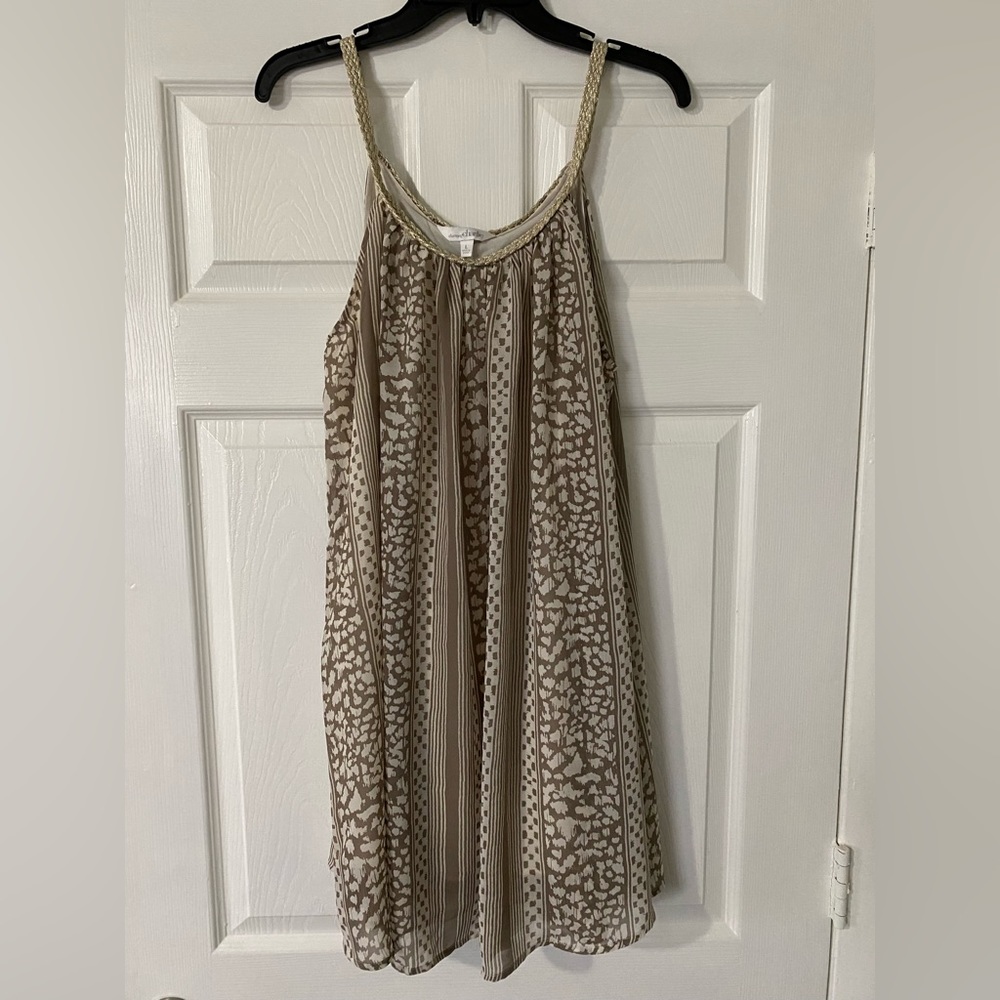 Size large, double lined, white and tan print, gold braided detail.